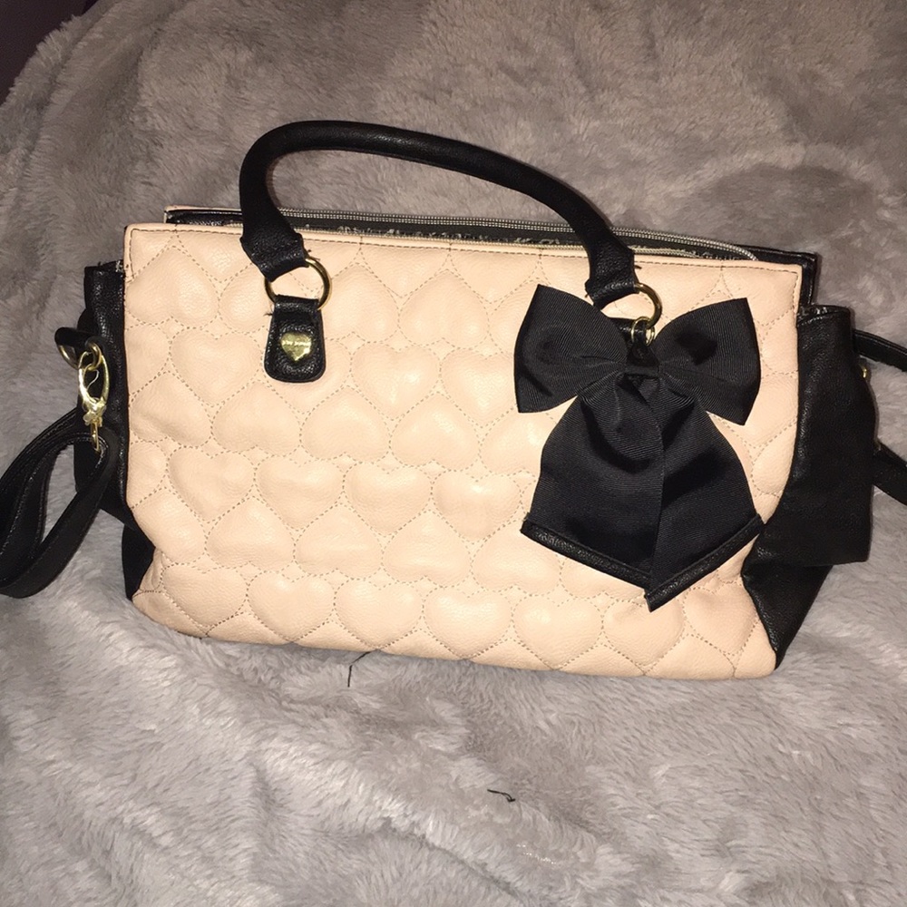 Pink hearted black purse